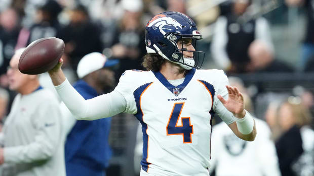 Jan 7, 2024; Paradise, Nevada, USA; Denver Broncos quarterback Jarrett Stidham (4) warms up before a game against the Las Vegas Raiders at Allegiant Stadium.